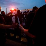 Municipal police officers look at a knife seized while patrolling in Ciudad Juarez, Mexic